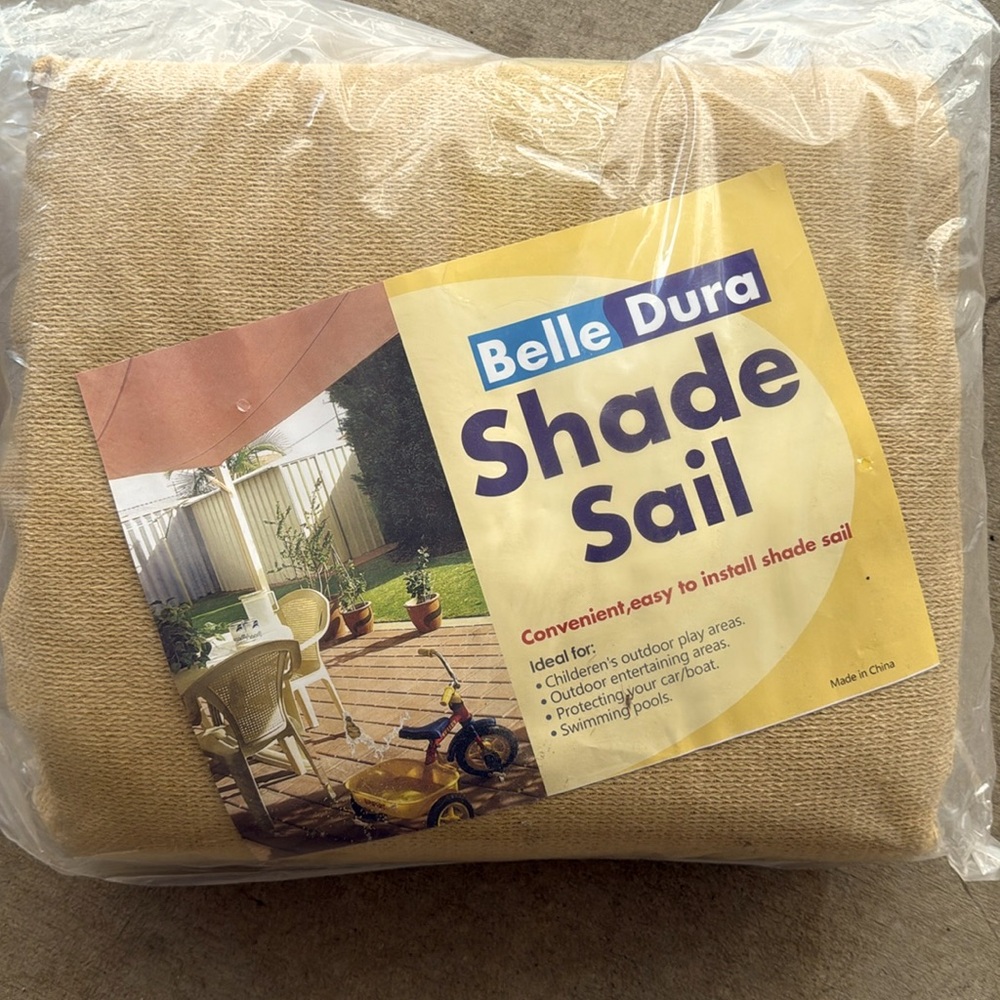 Brand new Shade Sail by Bella Dura 10'x13'. Never been opened